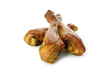 Roast chicken drumsticks isolated on white background