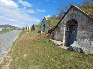 Rural area with stone wine cellars of Hercegkut in Hungary on a sunny day
