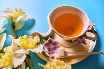 Green tea in a in a heart-shaped glass cup with a double bottom