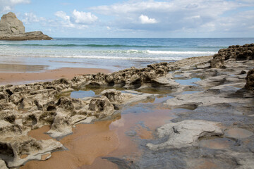 Fototapeta na wymiar Rocks and Cliff on Langre Beach; Santander