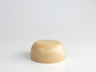 Rounded wooden plinth isolated on a white background with clipping paths. Used to display products.