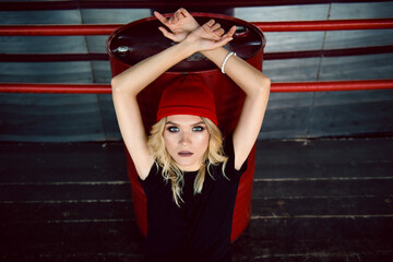 Hipster female with makeup and hairstyle on boxing ring