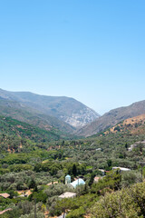 Fototapeta na wymiar A view of a valley between mountains in Crete island, Greece