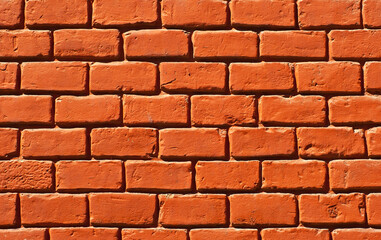 Texture of brick wall. Samples of wall or fence are presented at exhibitions. Orange brick close up.