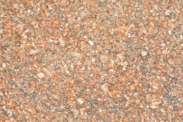 Texture of yellow and orange marble. Stone tile with natural pattern. Marble pavement closeup.