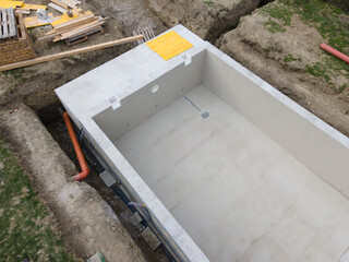 aerial drone shot of pool construction site almost finished spackling from above in a garden