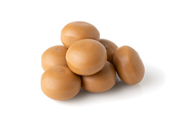 pile of caramel candies isolated on white background