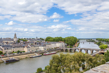 Fototapeta na wymiar Angers, France. Scenic view of the city and the Maine river with bridges 