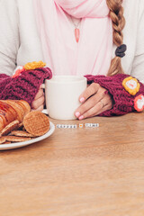 Girl with cup of coffee and breakfast. Letter blocks: coffee time.