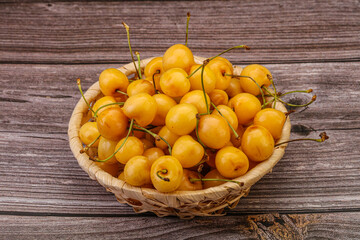 Sweet ripe yellow cherry heap
