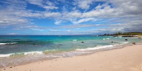Fototapeta na wymiar Panoramic view of the blue ocean and sky from the beach in Hawaii.