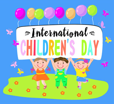 An image of cheerful children on the grass around butterflies. In their hands they hold a poster: "International Children's Day"