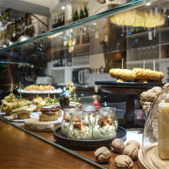 San Sebastian, Spain - April 2, 2021: Traditional Pintxos on display in a bar in San Sebastian