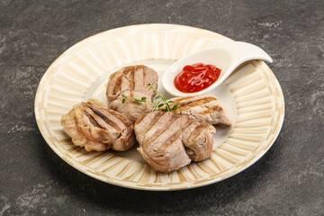 Grilled pork tenderlion with tomato sauce