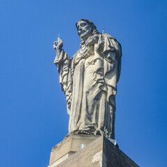 San Sebastian, Spain - April 2, 2021: The Sacred Heart statue and Castillo de la Mota, on Monte Urgull