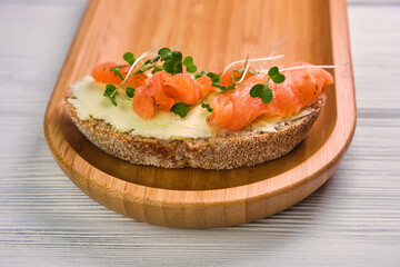 Grain yeast-free bread butter, microgreen and fish