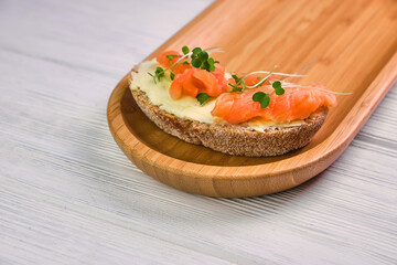 Grain yeast-free bread butter, microgreen and fish