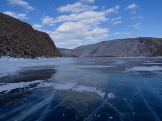 view from the ice to the shore and bay of Lake Baikal. Olkhon Island Siberia Russia