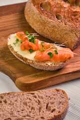 Grain yeast-free bread butter, microgreen and fish