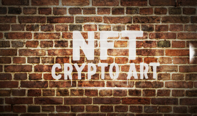Fototapeta na wymiar NFT Crypto Art spray painted inscription on the brick wall