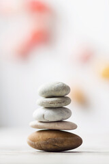 A pile of stones in a relaxing atmosphere with a colored background