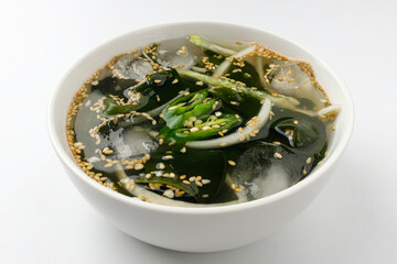 Seaweed cold soup on a white background