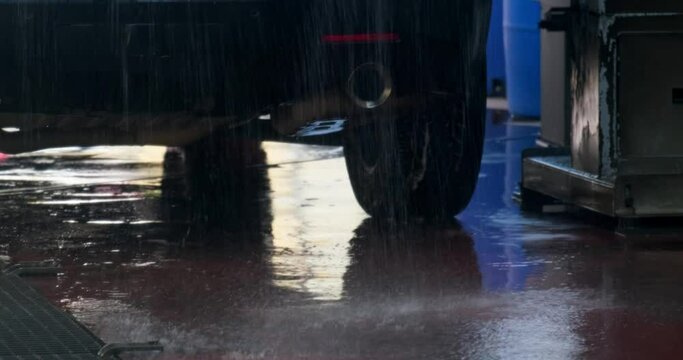 automatic car wash. large machine parts at the car wash. UHD video