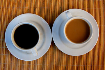 cup of coffee on wooden table