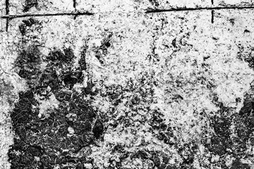 Texture of a concrete wall with cracks and scratches which can be used as a background
