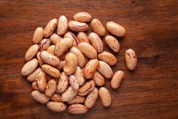 macro Close-up of Organic Lobia,  ( Lobia ) or kidney beans dal cleaned on wooden top background.