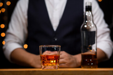 Bartender Serve Whiskey, on wood bar, 