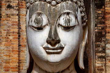 Ancient buddha statue Wat Si Chum temple in Sukhothai historical park Sukhothai, Thailand UNESCO world heritage