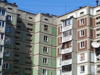 Soviet apartment buildings. Apartment block. Soviet architecture. Ust-Kamenogorsk (Kazakhstan). Concrete apartment buildings. Bright. Closeup detailed fragment. Plattenbau