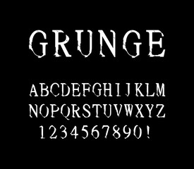 Font of grunge letters and numbers