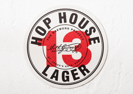 LONDON, UK - AUGUST 22, 2018: 13 Hop House Lager beer beermat coaster on white background.