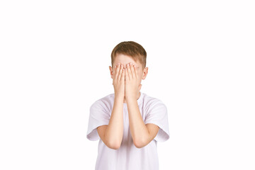 Children portrait in white t-shirt. Studio isolated concept. Oops emotion. Male person frustration. Calm conflict cover