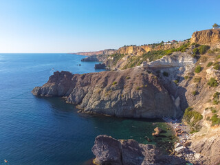 Cape Fiolent. Beautiful views of the Black Sea coast at Cape Fiolent in summer in clear weather. Aerial view to beautiful sea coast with turquoise water and rocks