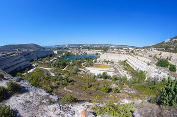 Fototapeta na wymiar top view of the blue lake in the stone quarry, blue lake, flooded stone quarry