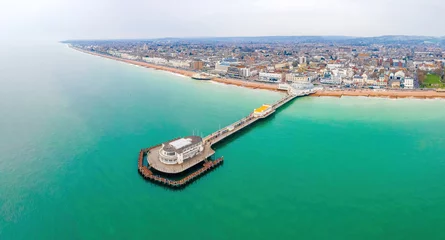 Foto auf Acrylglas An aerial view of Worthing Pier, a public pleasure pier in Worthing, West Sussex, England © Alexey Fedorenko