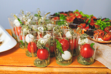 Catering service. Snacks for guests on the table.