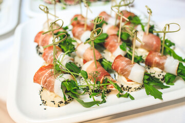 Catering service. Snacks for guests on the table.
