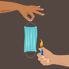 Burning the mask. No masks. Protective medical mask.The hand sets fire to the surgical mask. Destroy respirators. End of the coronavirus pandemic. End of mask mode.