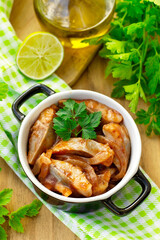 Pickled herring in tomato sauce with sweet onions