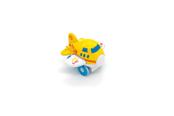 Plastic toy passenger jet plane on white background