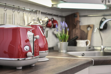 Red toaster and electric kettle in retro slile
