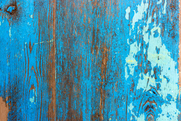 Old wood texture. Spoiled paint on a wooden board. Rotten wood flooring. Old wooden floor.