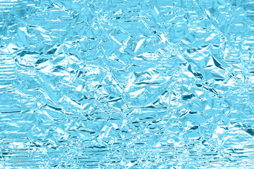 Crumpled sheet of foil. Close-up. Background. Texture.