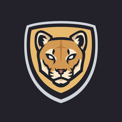 Mountain lion mascot head logo. Sports cougars logo. Big cat vector illustration. © Afivctr x INF Studio