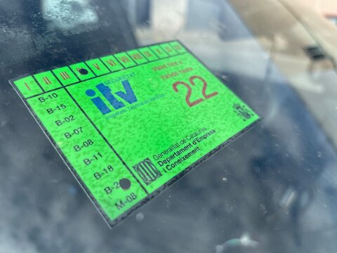 Sabadell, Spain, 04 16 2021, ITV label (Technical Vehicle Inspection) in the front of a car