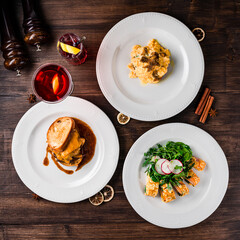 Breakfast set with omelet sandwich on wooden table top view